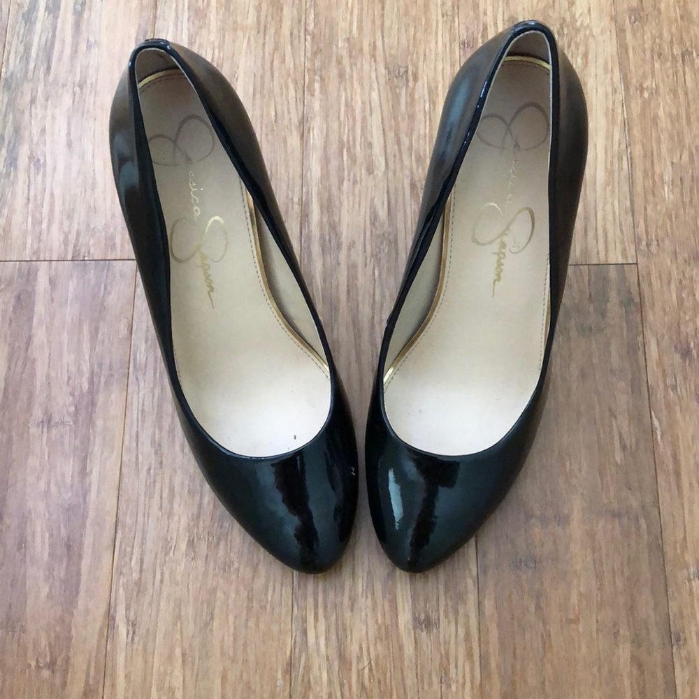 Black patten leather pumps